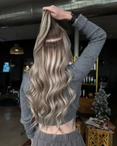 Weft hair extensions installation with seamless blonde blend and invisible row placement