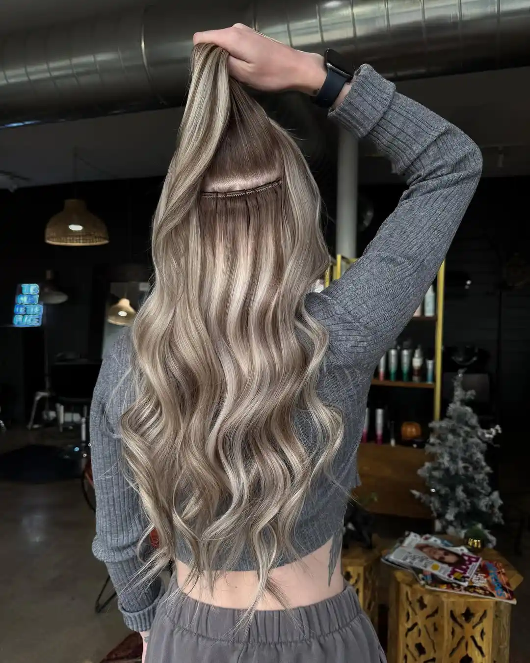 Weft hair extensions installation with seamless blonde blend and invisible row placement