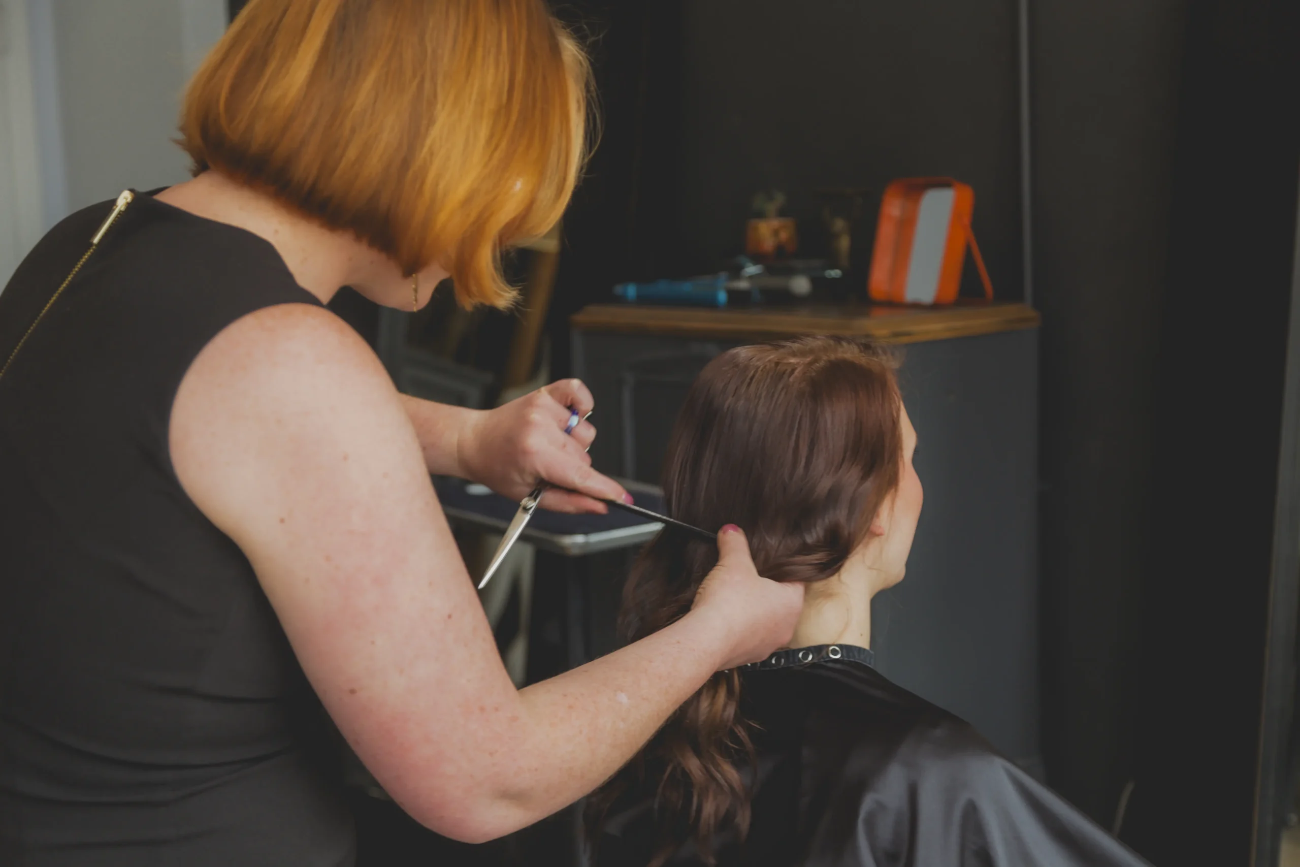 Precision haircut in progress at Studio 303 hair salon in Englewood, Colorado