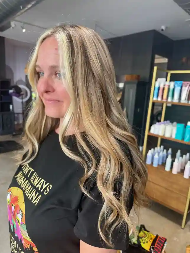 Bronde balayage with face framing highlights and long waves at Studio 303 hair salon Englewood CO
